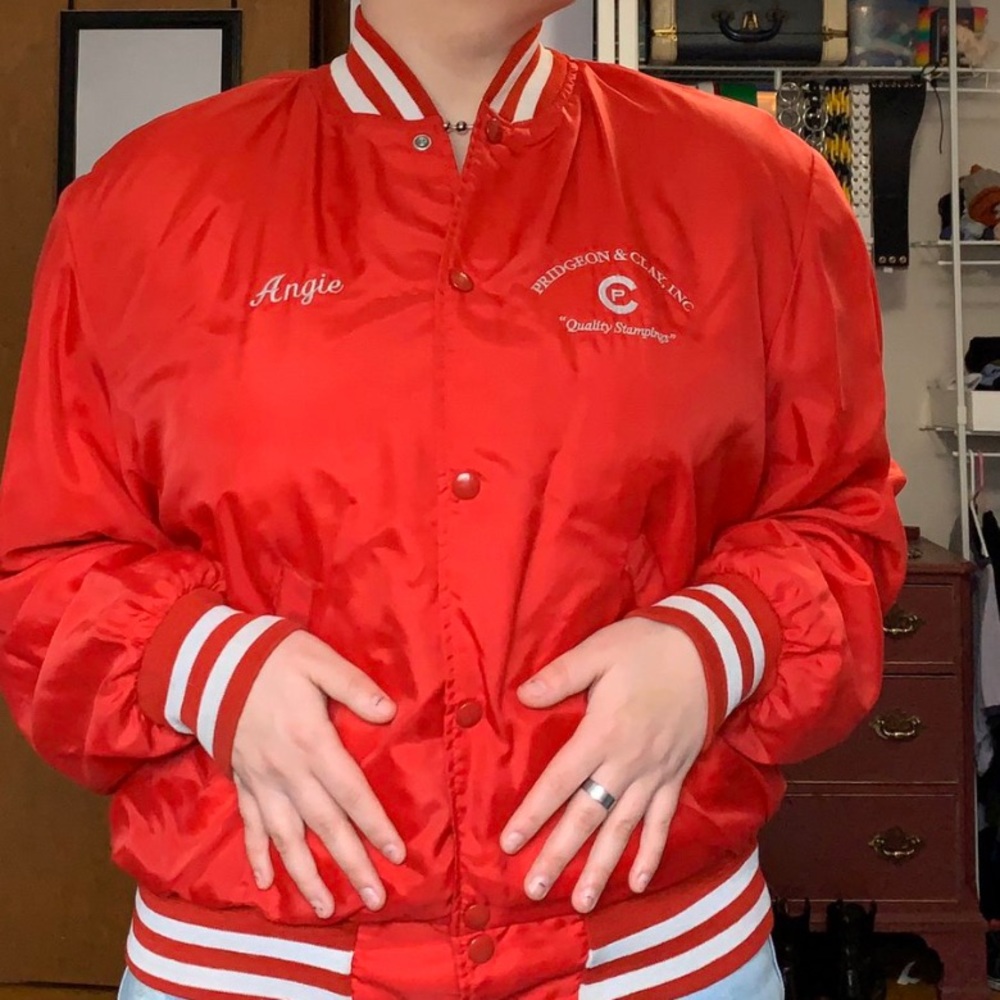 red bomber jacket with white stripes